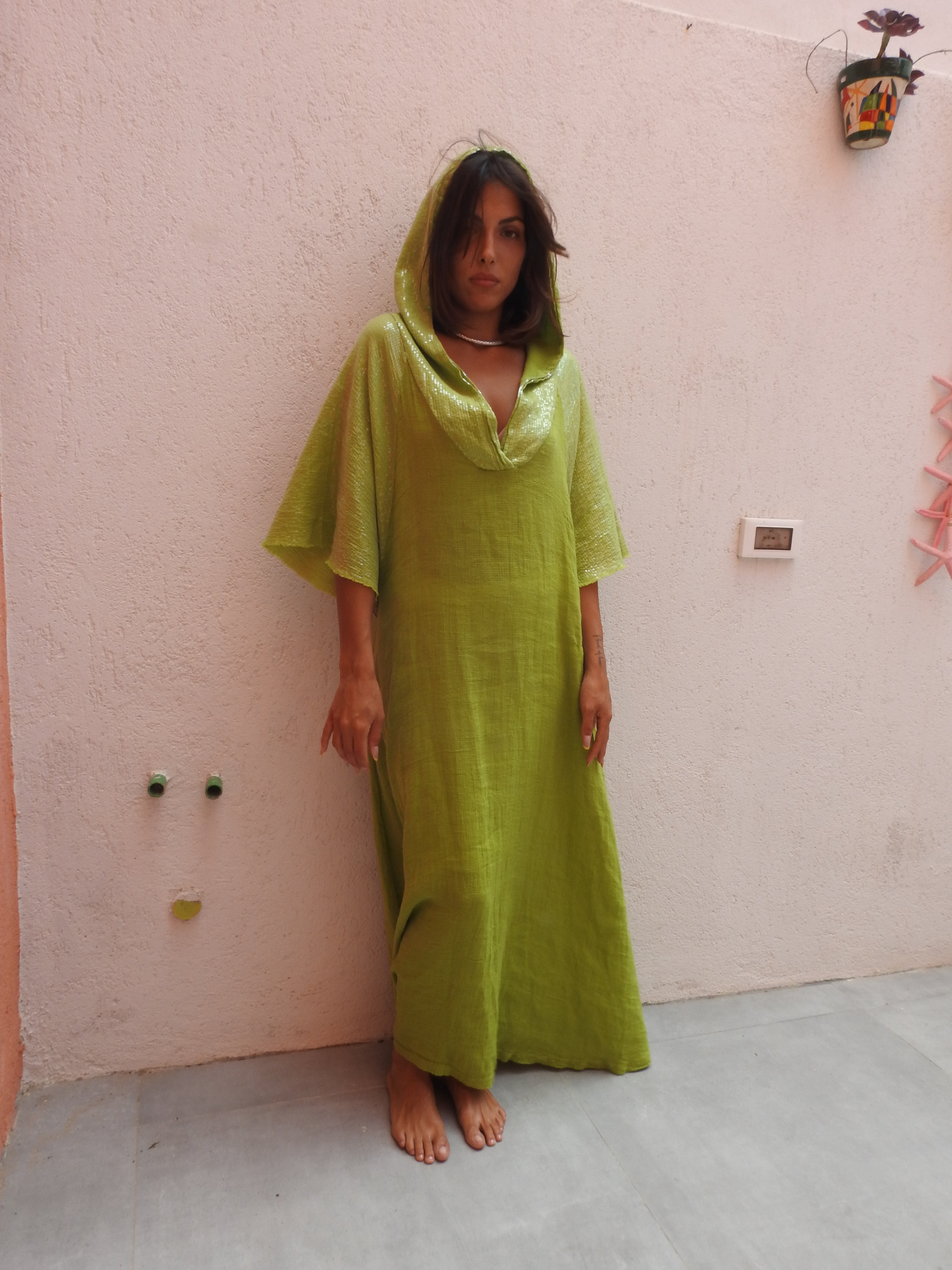 Green dress with a hoodie Strega