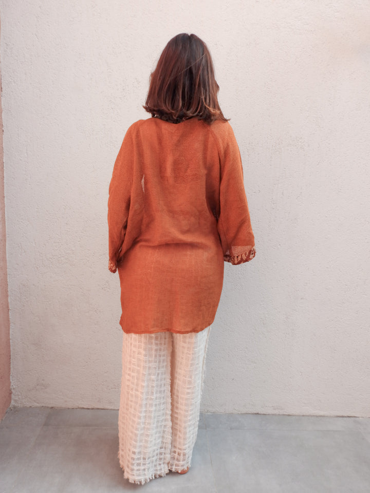 Sleeveless wrap-style jacket