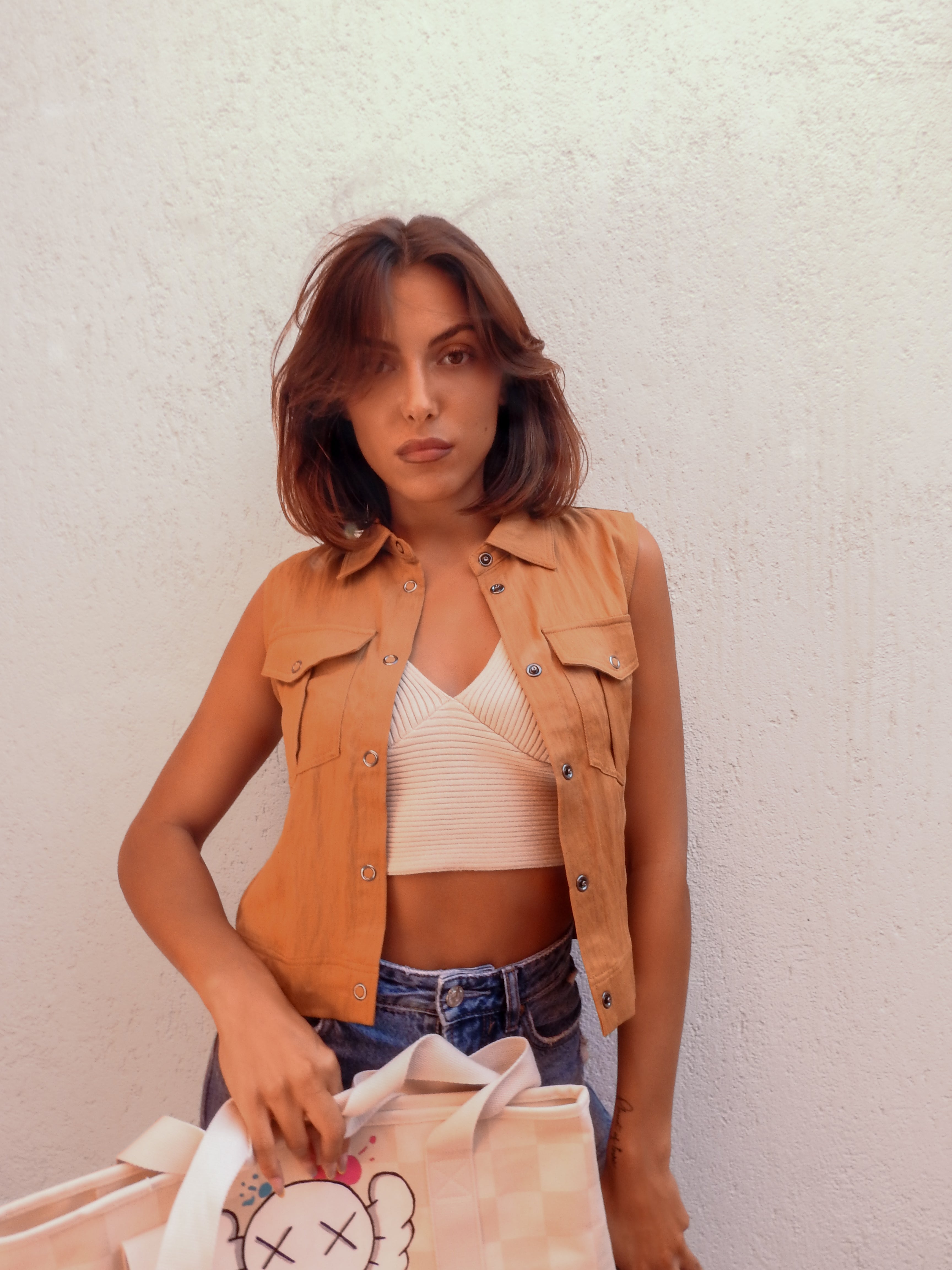 Tan sleeveless vest