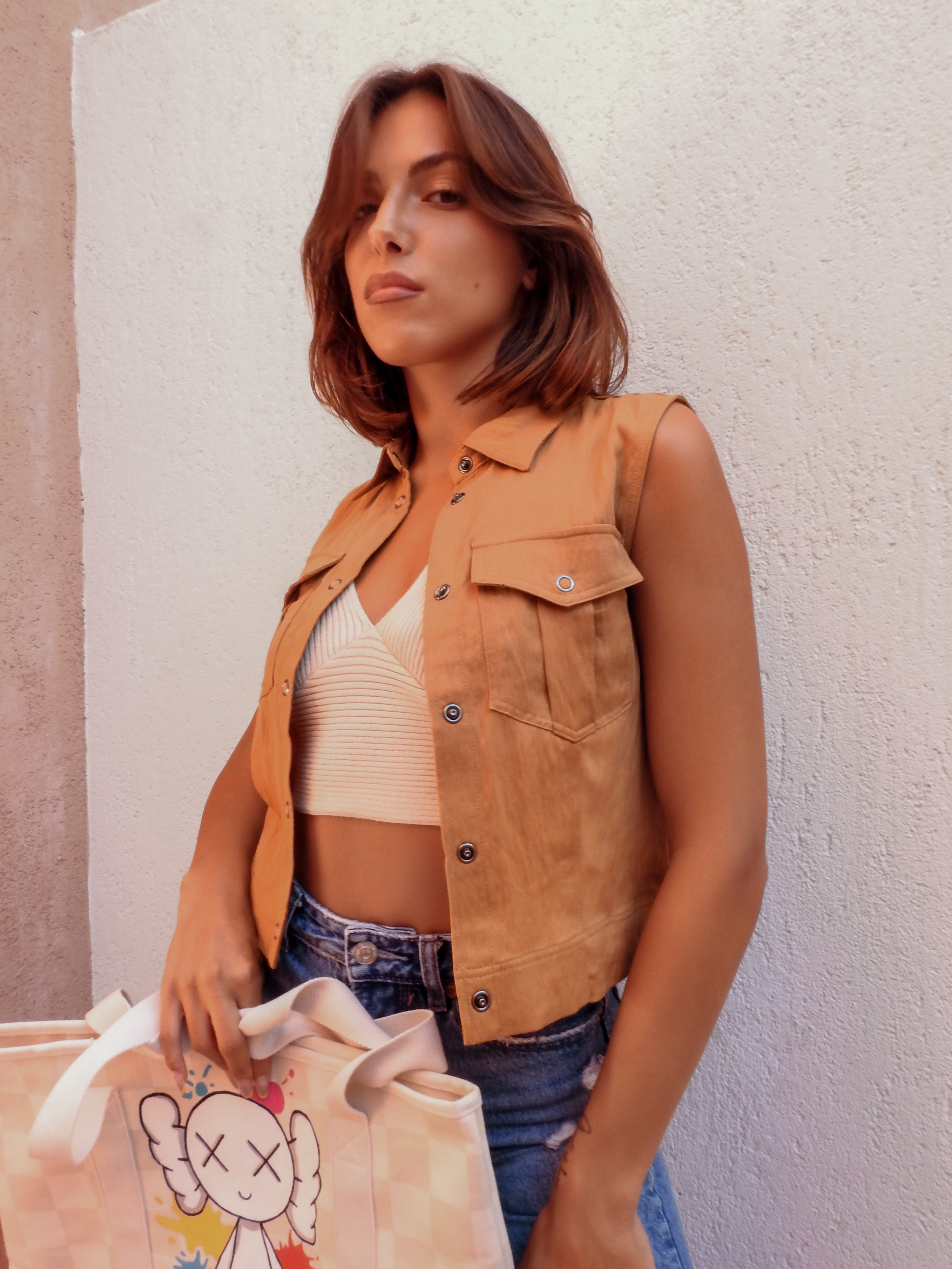 Tan sleeveless vest