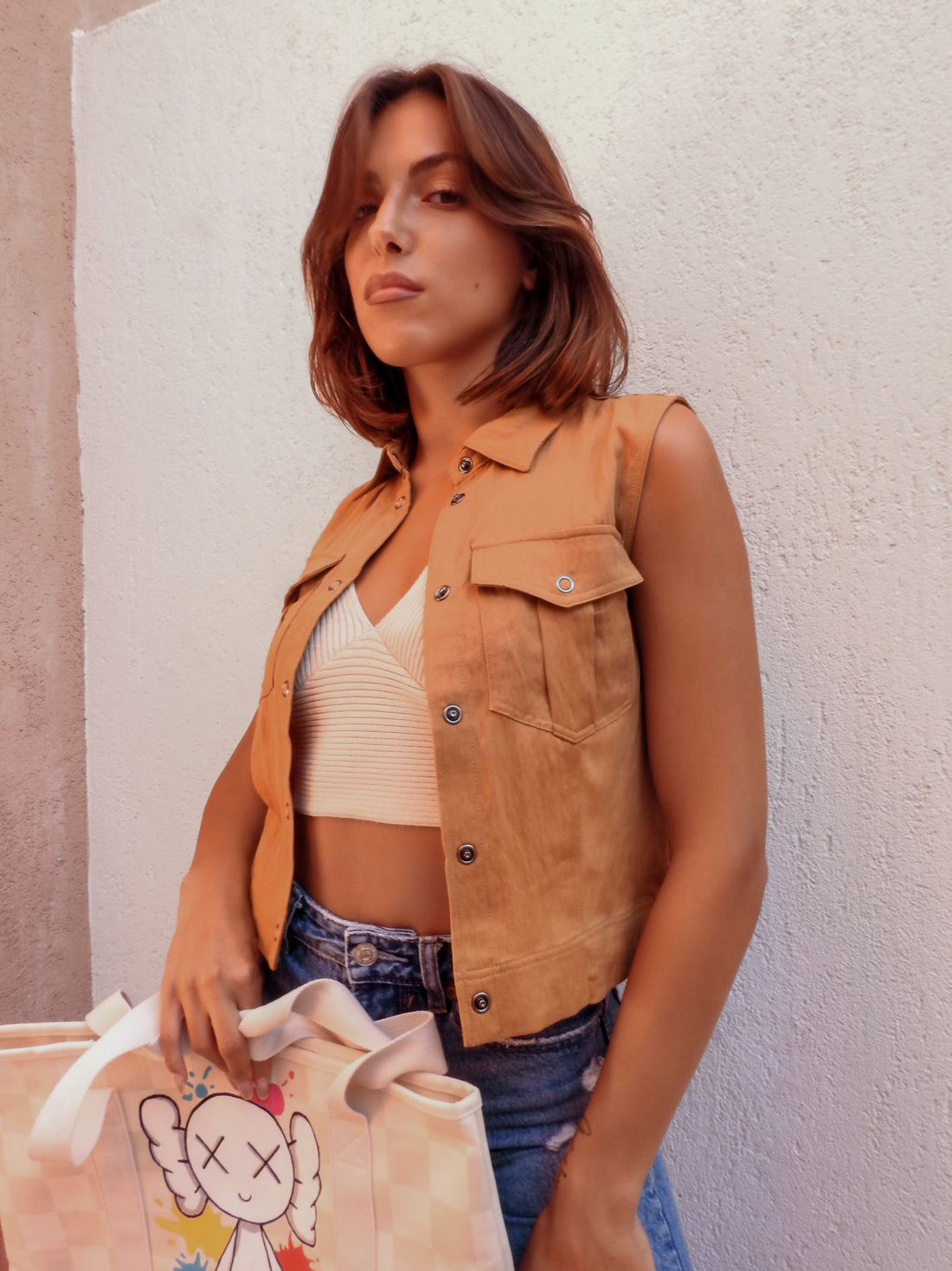 Tan sleeveless vest
