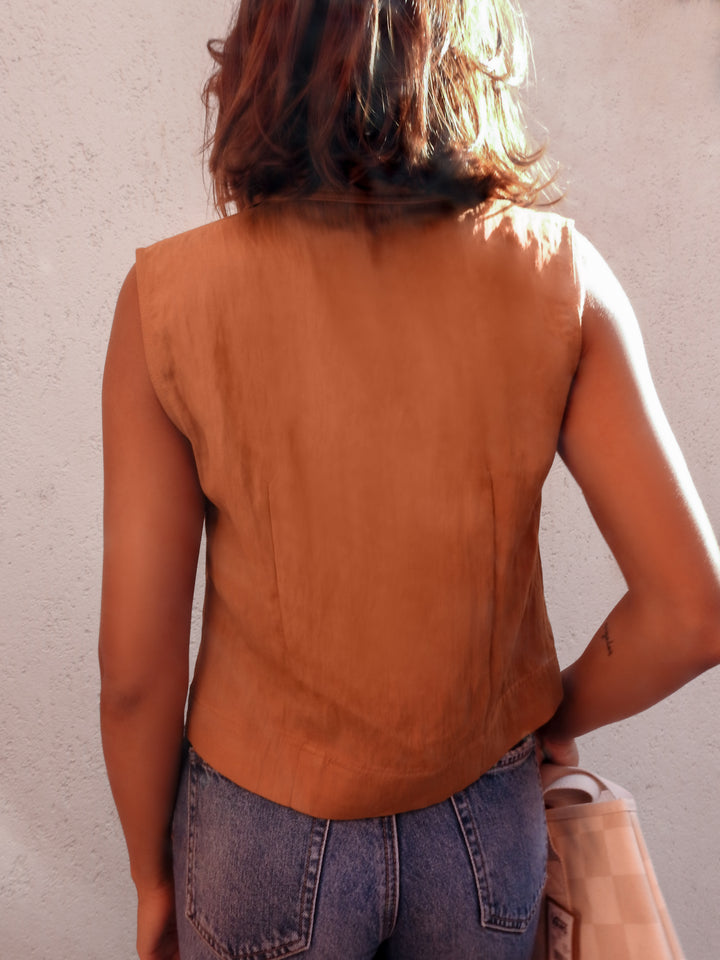 Tan sleeveless vest